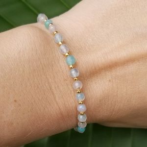 Woman's bracelet with gold tone spacers